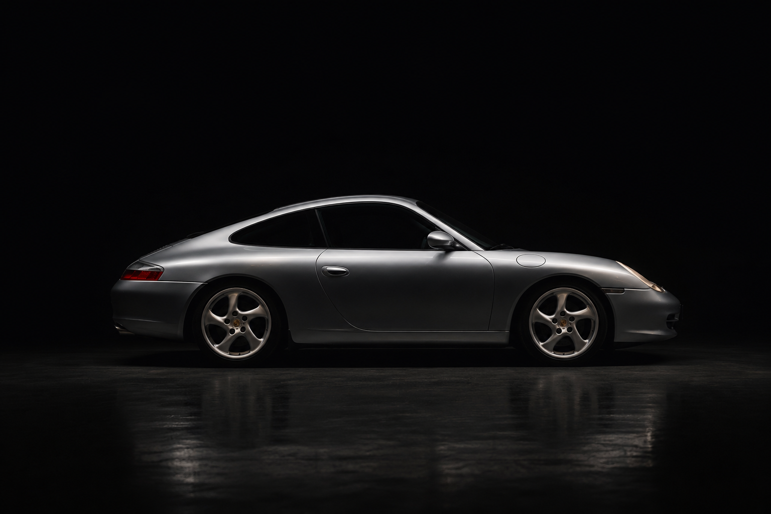 Sleek side profile of the Porsche 911 996 GT2 displaying GT2 spoiler and motorsport design